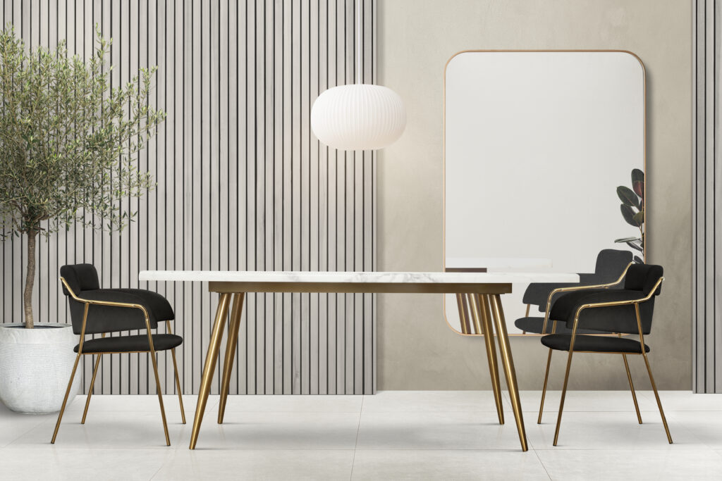 Ambiente sofisticado com detalhes metálicos em ouro envelhecido.